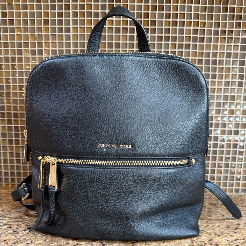 Leather Michael Kors backpackk 12x15(approx)